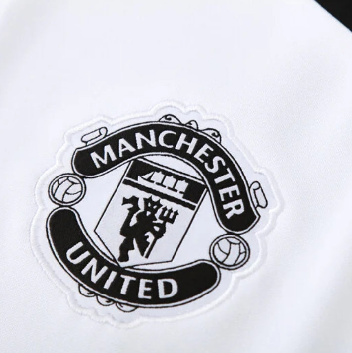 Manchester United "Noir Eclipse" Tracksuit